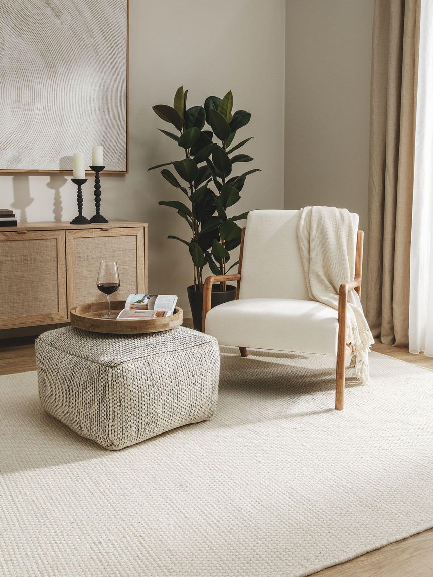 Handgefertigter Woll-Pouf Rocco 55x55x30 cm Beige / Schwarz