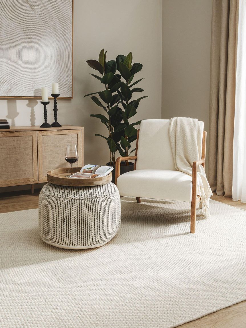Handgefertigter Woll-Pouf Rocco 55x55x30 cm Beige / Schwarz