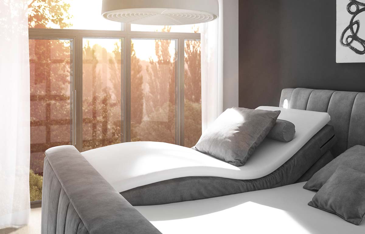Dallas Boxspringbett 180x200 cm , inkl. Motor & motorisierter TV-Halterung Grau